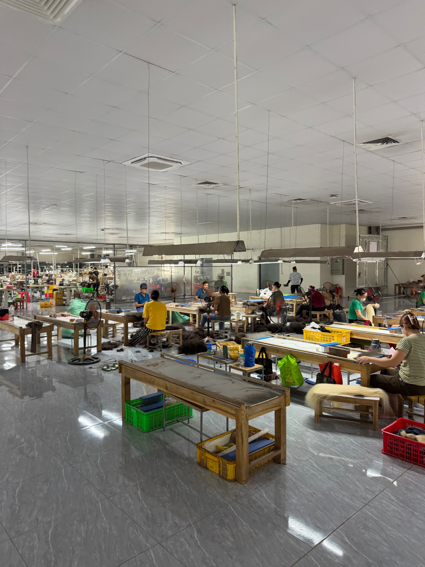 RemyPatra Manipur factory production room with sorting and preparation teams at work