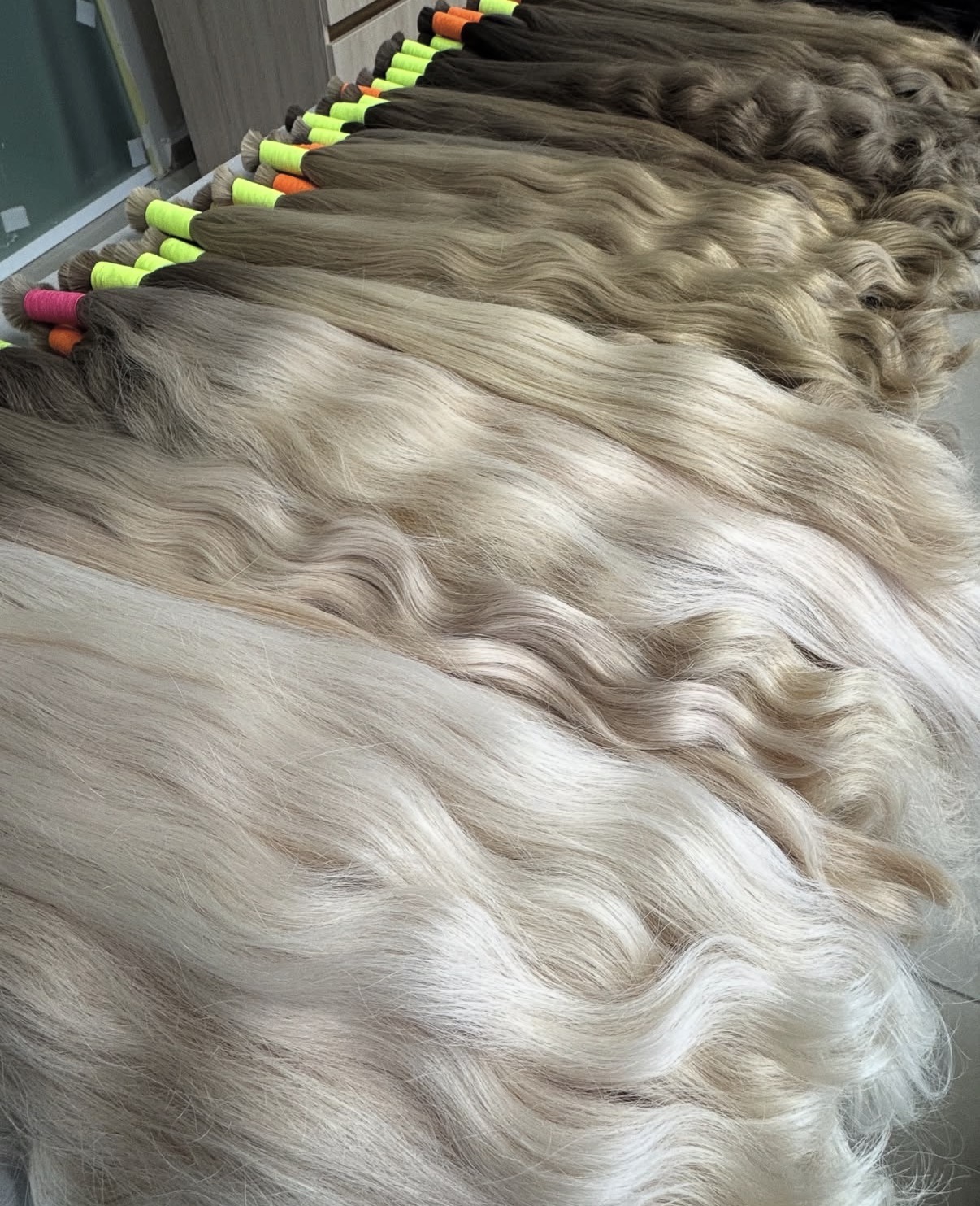 Large production batch of Indian baby hair in cool developed blonde shades