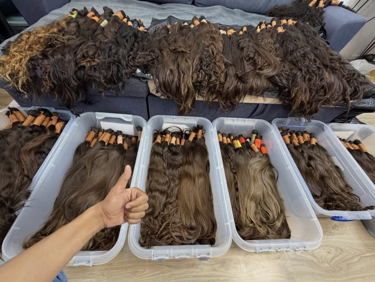 Sorted brown virgin lots boxed by shade and length before drawing