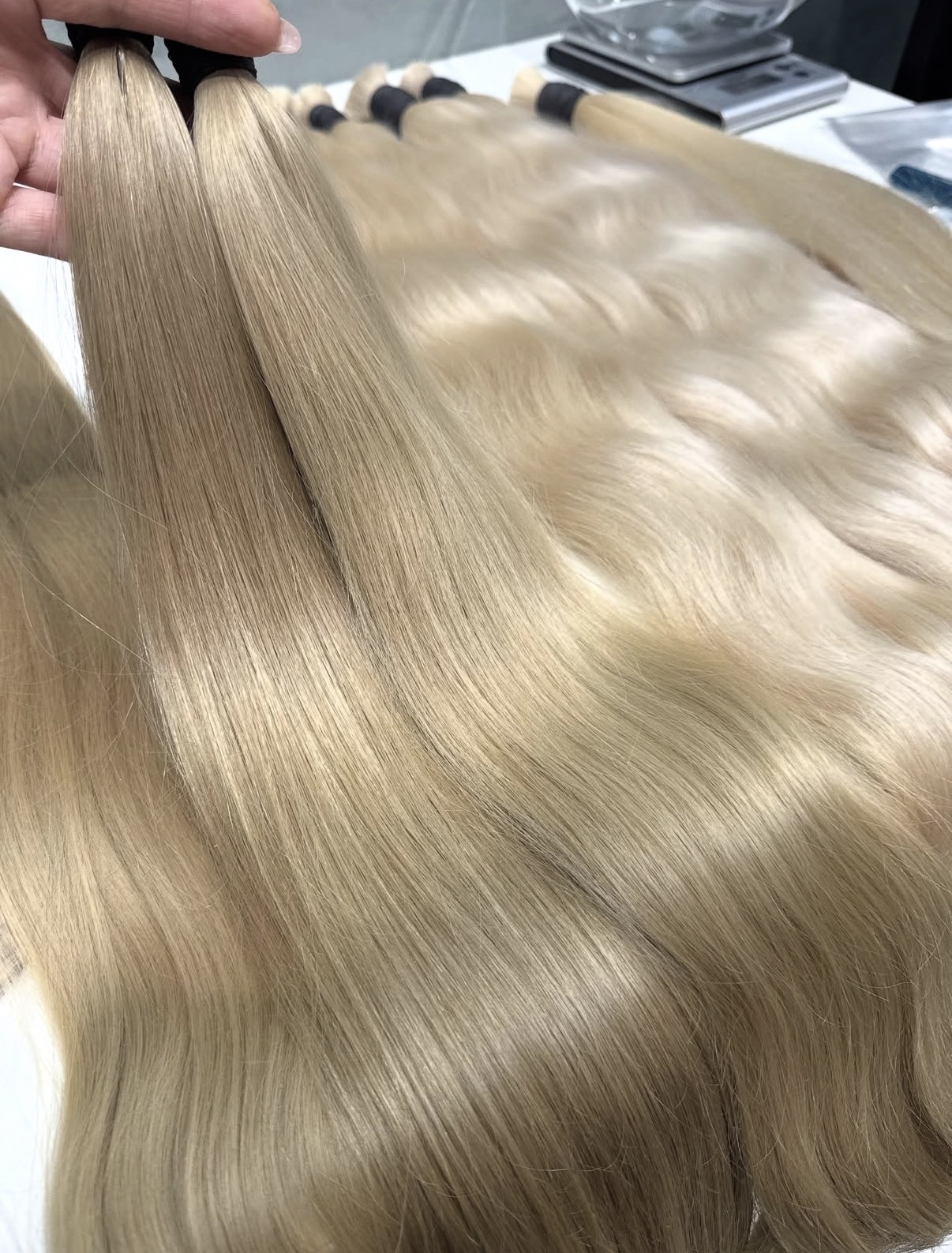 Close inspection of smooth pale blonde Indian baby hair after colour development
